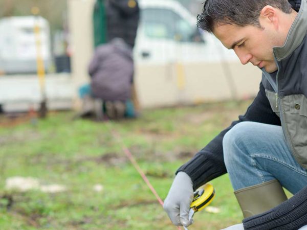 Measuring lawn ahead of surfacing